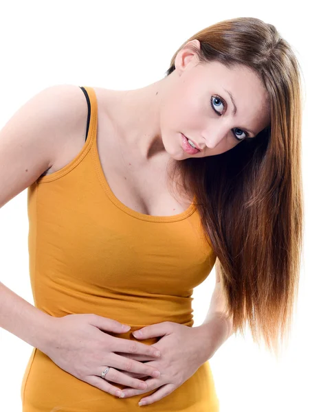 Hermosa mujer joven dolor de estómago sobre fondo blanco —  Fotos de Stock