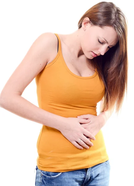 Beautiful young woman stomachache on white background — Zdjęcie stockowe