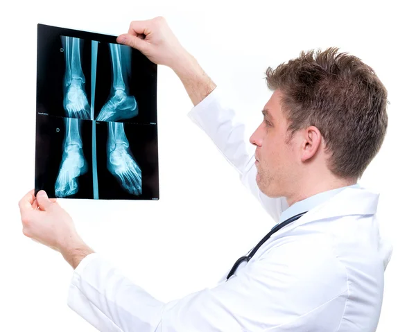 Attractive and expressive doctor holding x-ray — Stock Photo, Image