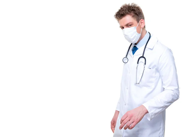 Male nurse or doctor portrait wearing surgical mask — Stock Photo, Image