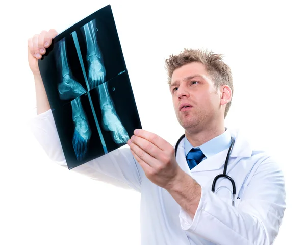 Cheerful doctor examining feet x-ray Stock Photo