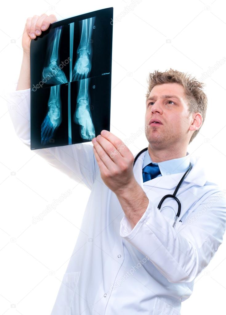 cheerful doctor examining feet x-ray