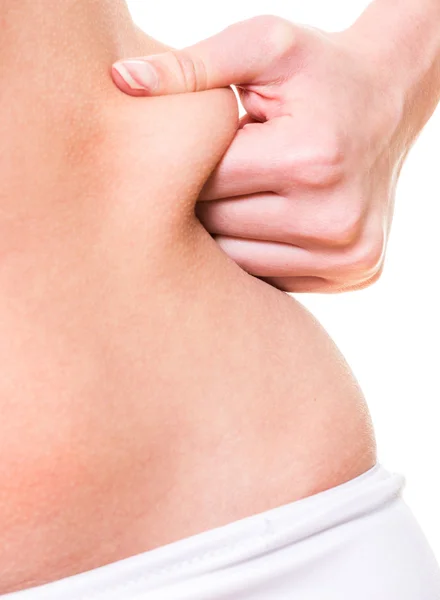 Close up woman pinching skin of her hip — Stock Photo, Image