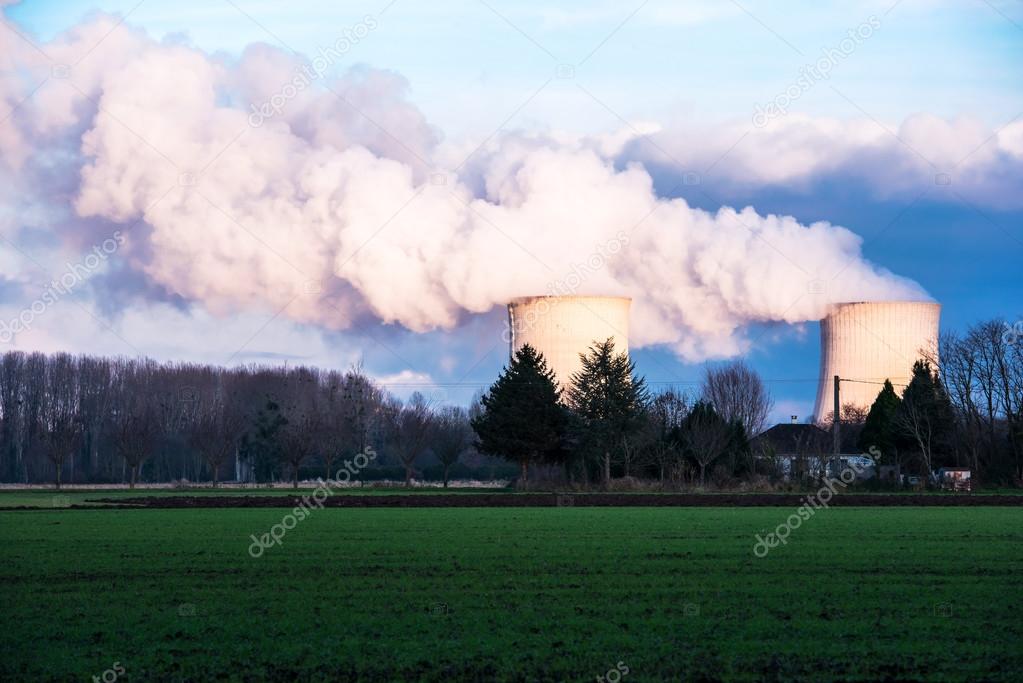 A nuclear power plant located in the countryside close to homes