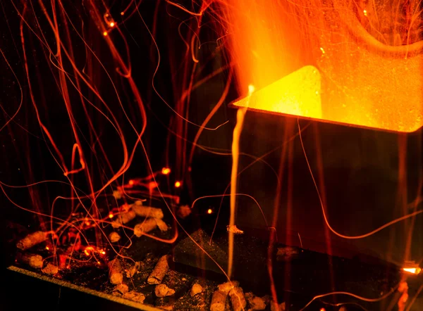 Closeup on the combustion of an pellet stove — Stock Photo, Image