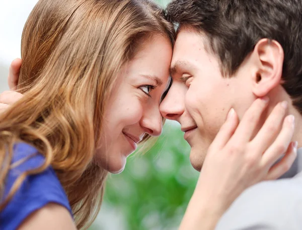 Attractive couple of lovers look at each other with love — Stock Photo, Image