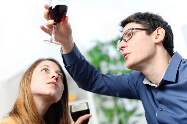 Very beautiful young couple toasting wine glasses — Stock Photo, Image