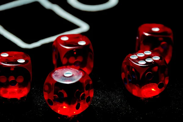 Red dices on casino table — Stock Photo, Image