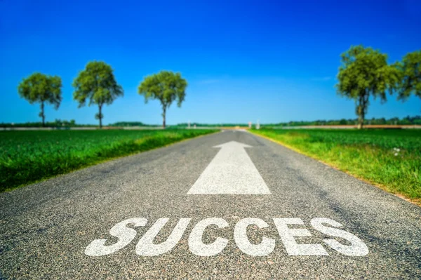 Sucess word painted on asphalt road — Stock Photo, Image