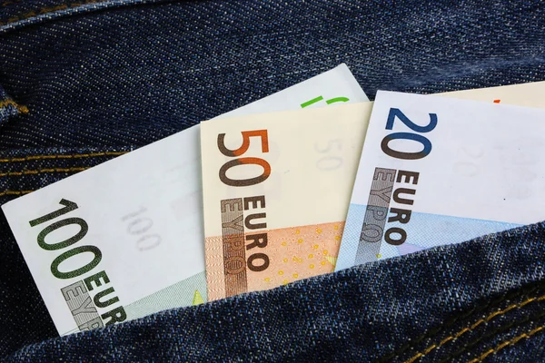 Euro banknotes in jeans pocket — Stock Photo, Image