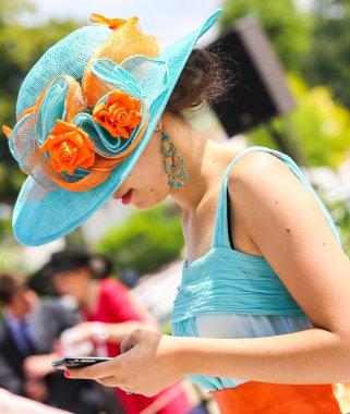 Elegant woman with her beautiful hat clipart