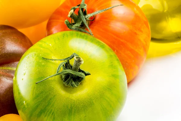 Many varieties of colorful tomatos — Stock Photo, Image