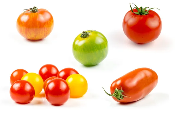 Muchas variedades de tomates coloridos — Foto de Stock