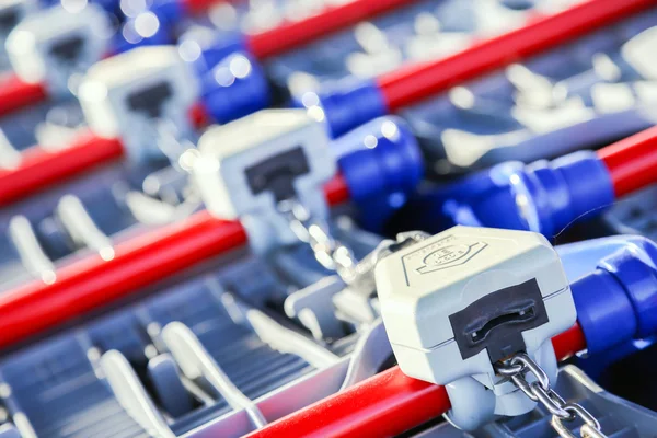 Row of shopping trolleys or carts in supermarket — Stock Photo, Image