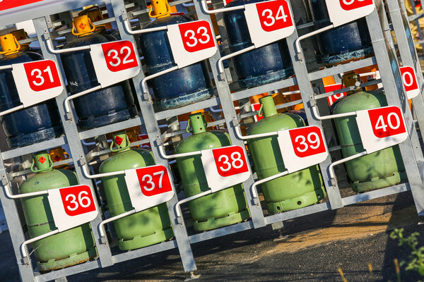 stacks of gas cylinders on a distributor