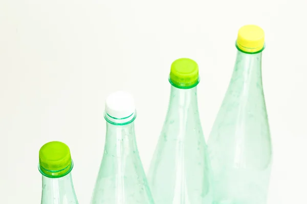 Botellas de plástico aisladas en blanco — Foto de Stock