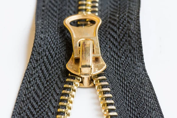 Black Zipper Gold Ziplock White Blurred Background — Stock Photo, Image