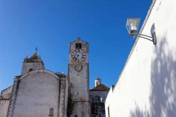 Clock tower in Tavira — Stock Photo, Image