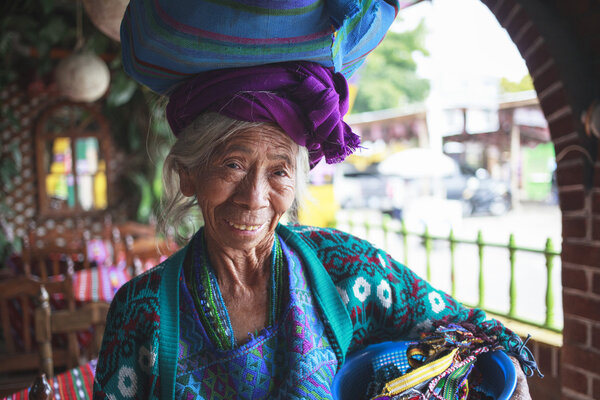 PANAJACHEL, GUATEMALA - APRIL 05: Old woman in ethnic traditiona