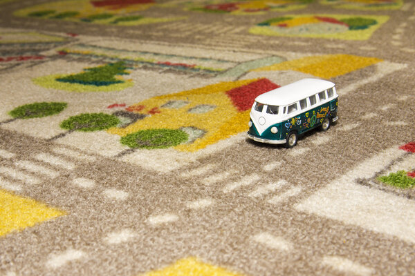 Toy car (bus) on carpet