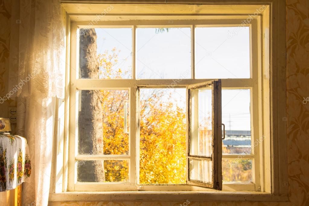 Open window in autumn village