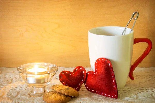 Valentines with candle and cup of tea — Stock Photo, Image