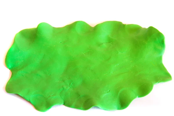 Plasticina fundo verde — Fotografia de Stock
