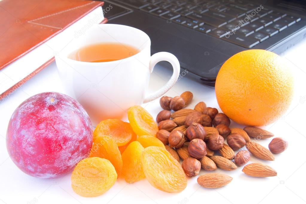 Healthy snack in office Stock Photo by ©Mizina 24588295