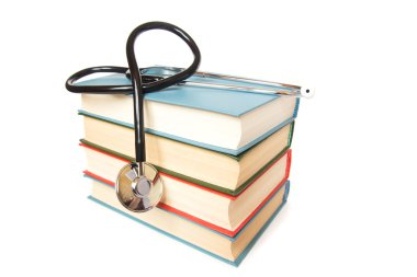 Steteskop ve kitap yığını