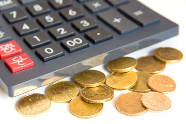 Сalculator and coins — Stock Photo, Image