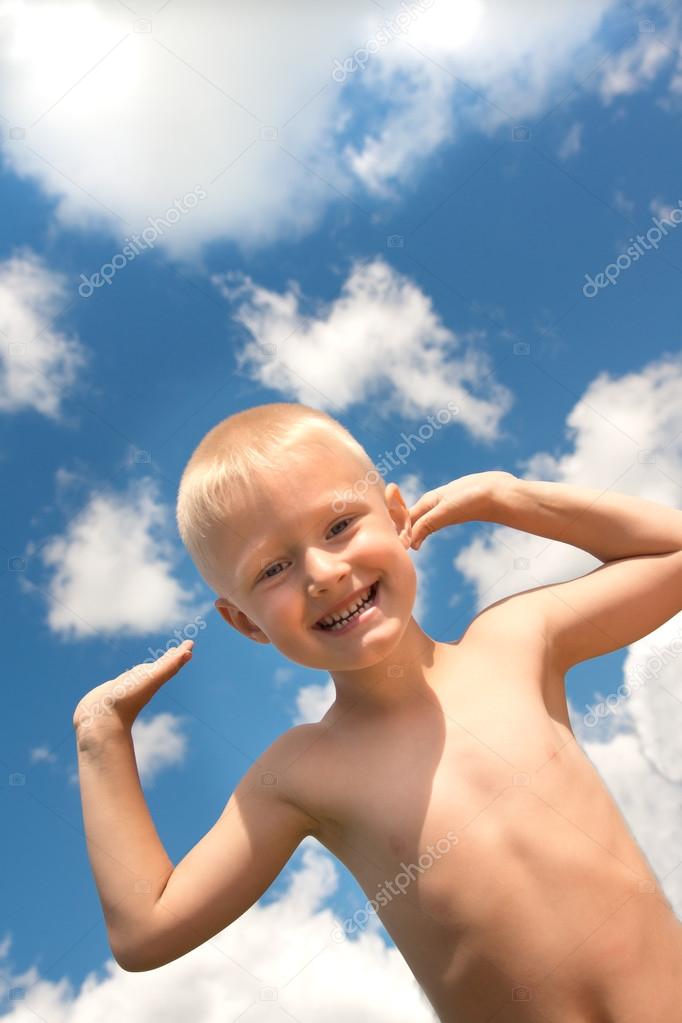 Happy child and blue sky
