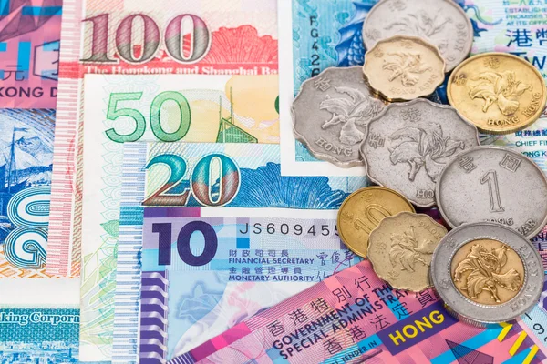 Billete en dólares de Hong Kong en primer plano con monedas — Foto de Stock