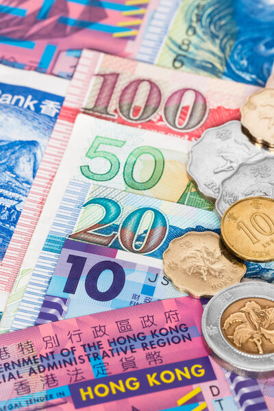 Hong Kong dollar money banknote close-up with coins