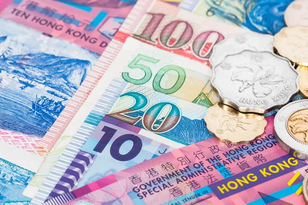 Hong kong dollar geld bankbiljet close-up met munten — Stockfoto