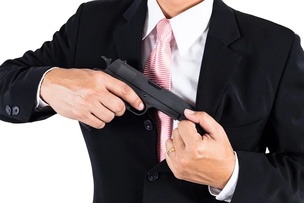 Επιχειρηματίας να βγάλει όπλο από το σακάκι έννοια για επιθετικότητα — Φωτογραφία Αρχείου