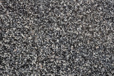 arka plan olarak parlak siyah ve beyaz tahıl granit