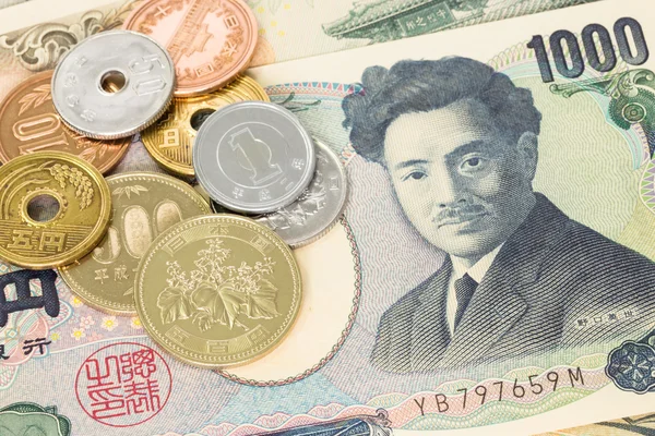 Japoński pieniądze jenów banknotów i monet zbliżenie — Zdjęcie stockowe