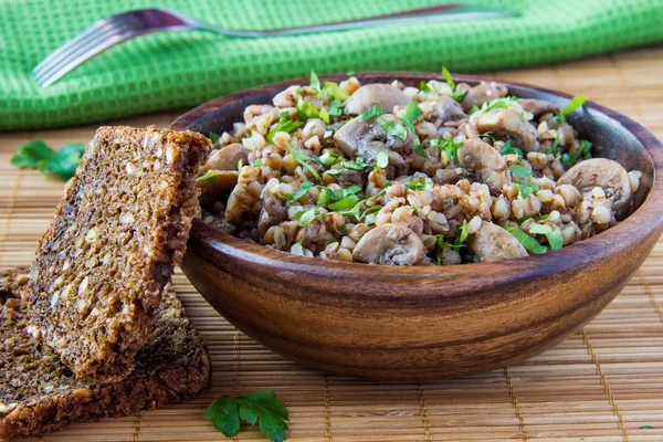 Buckwheat with mushrooms and parsley — Stock Photo, Image