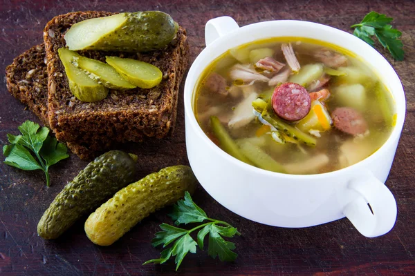 Soup with pickled cucumber and meat — Stock Photo, Image