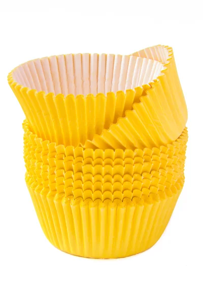 Tazze di cottura cupcake giallo — Foto Stock