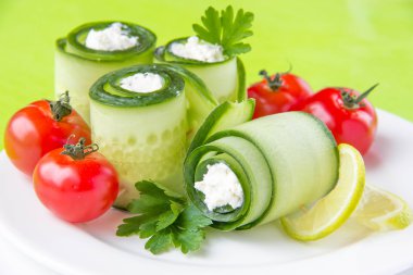 Cucumber rolls with cheese clipart