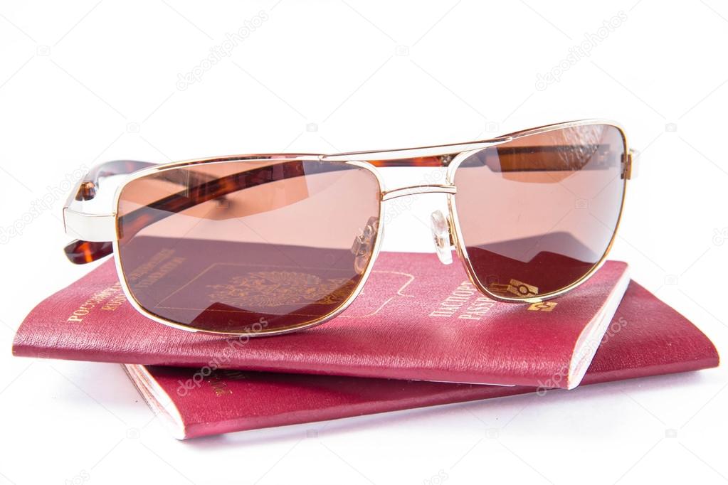 Sun glasses on foreign passport