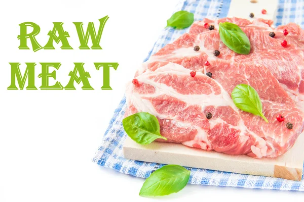 Raw meat with pepper and basil on white — Stock Photo, Image
