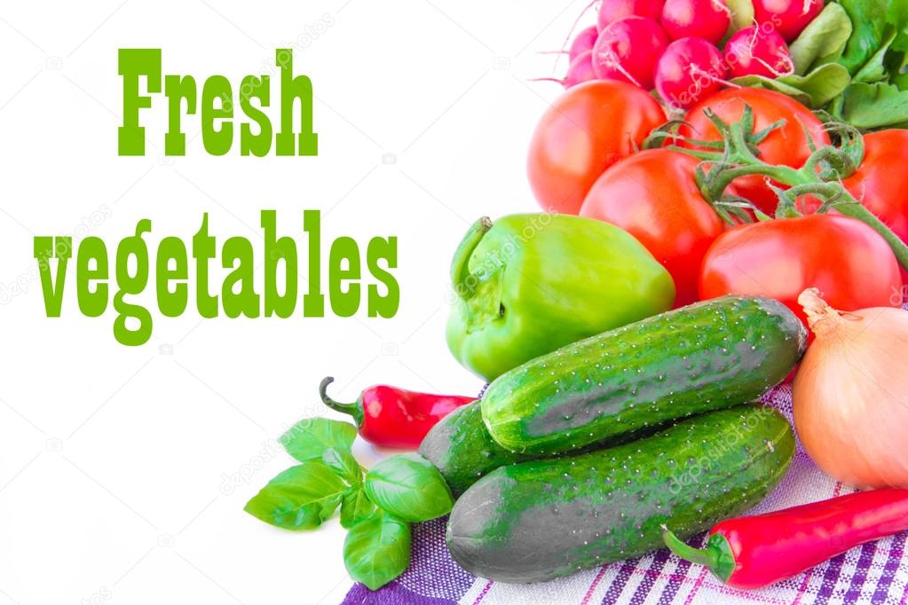 Fresh spring vegetables for salad on towel