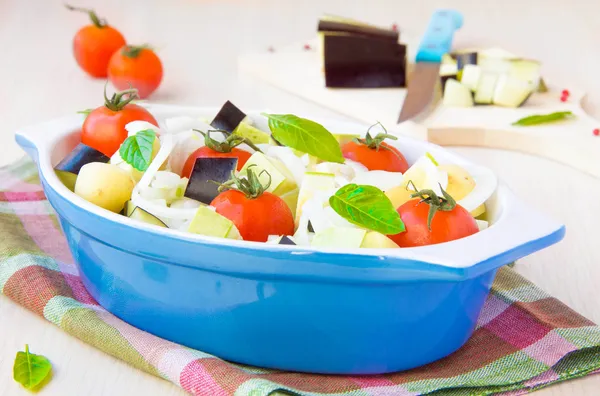 Mixed vegetable in blue bowl for baked in the oven — Stock Photo, Image