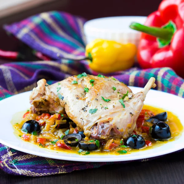 Ragout from stewed legs of rabbit with herbs, vegetables and oli — Stock Photo, Image