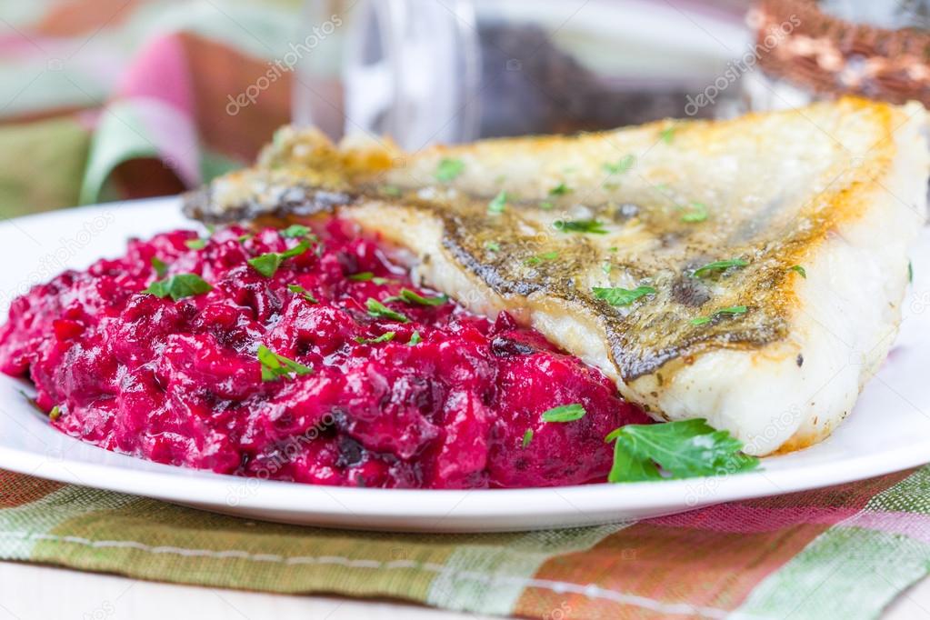 Fried fish fillet of perch with mashed beet and potato