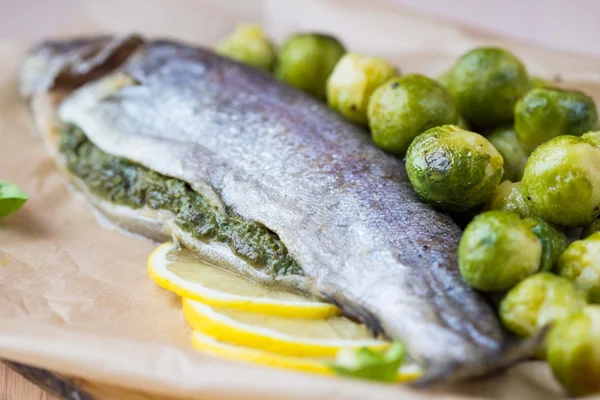 Two fish, rainbow trout stuffed with green herb sauce, Brussels — Stock Photo, Image
