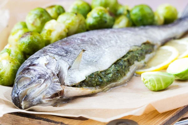 Two fish, rainbow trout stuffed with green herb sauce, Brussels