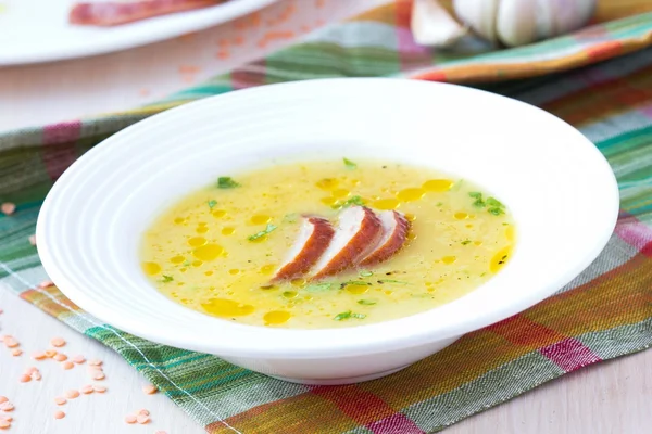 Cream soup of red lentil with smoked meat, duck, chicken — Stock Photo, Image